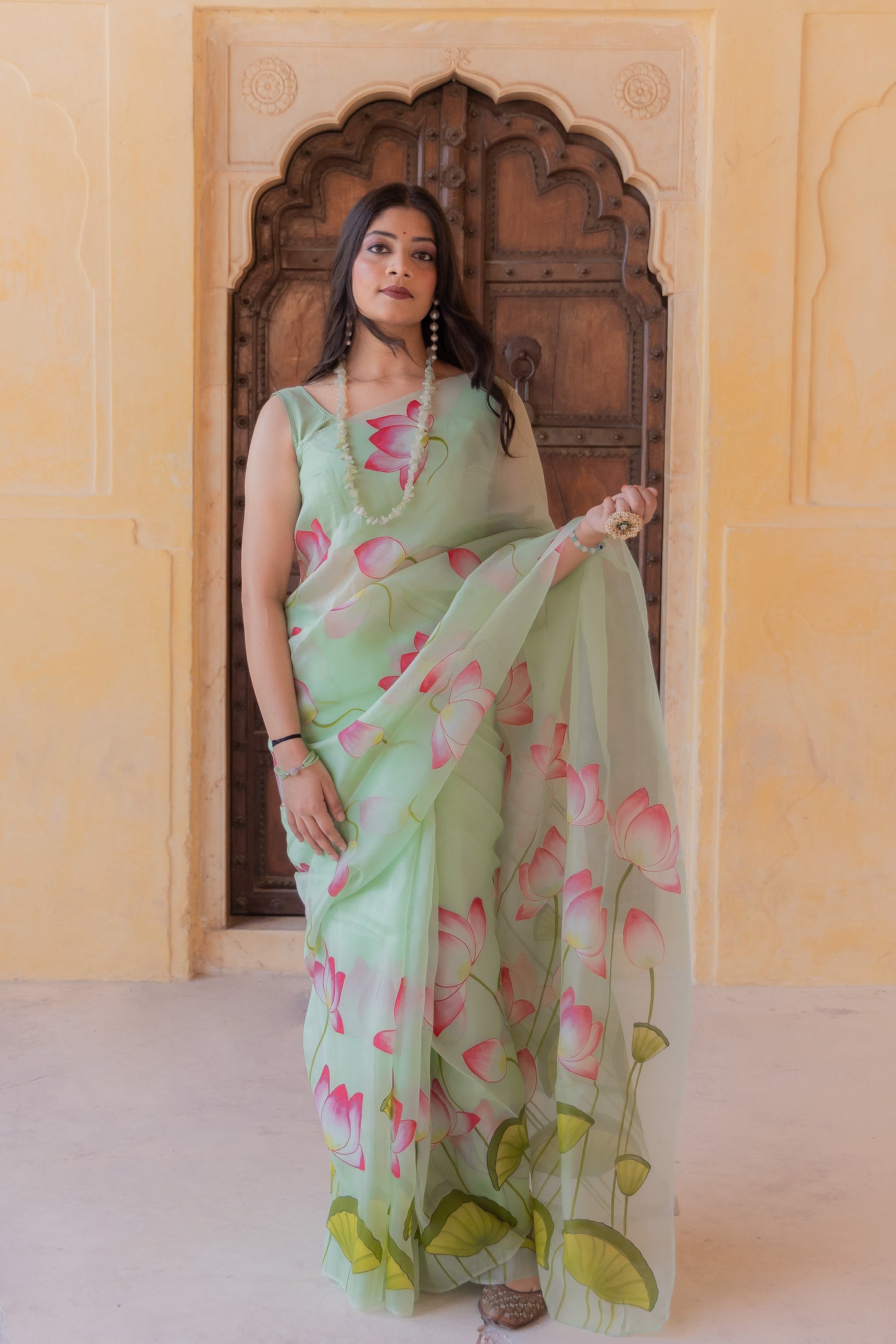 Draped in serenity, adorned with lotus beauty 🌸✨