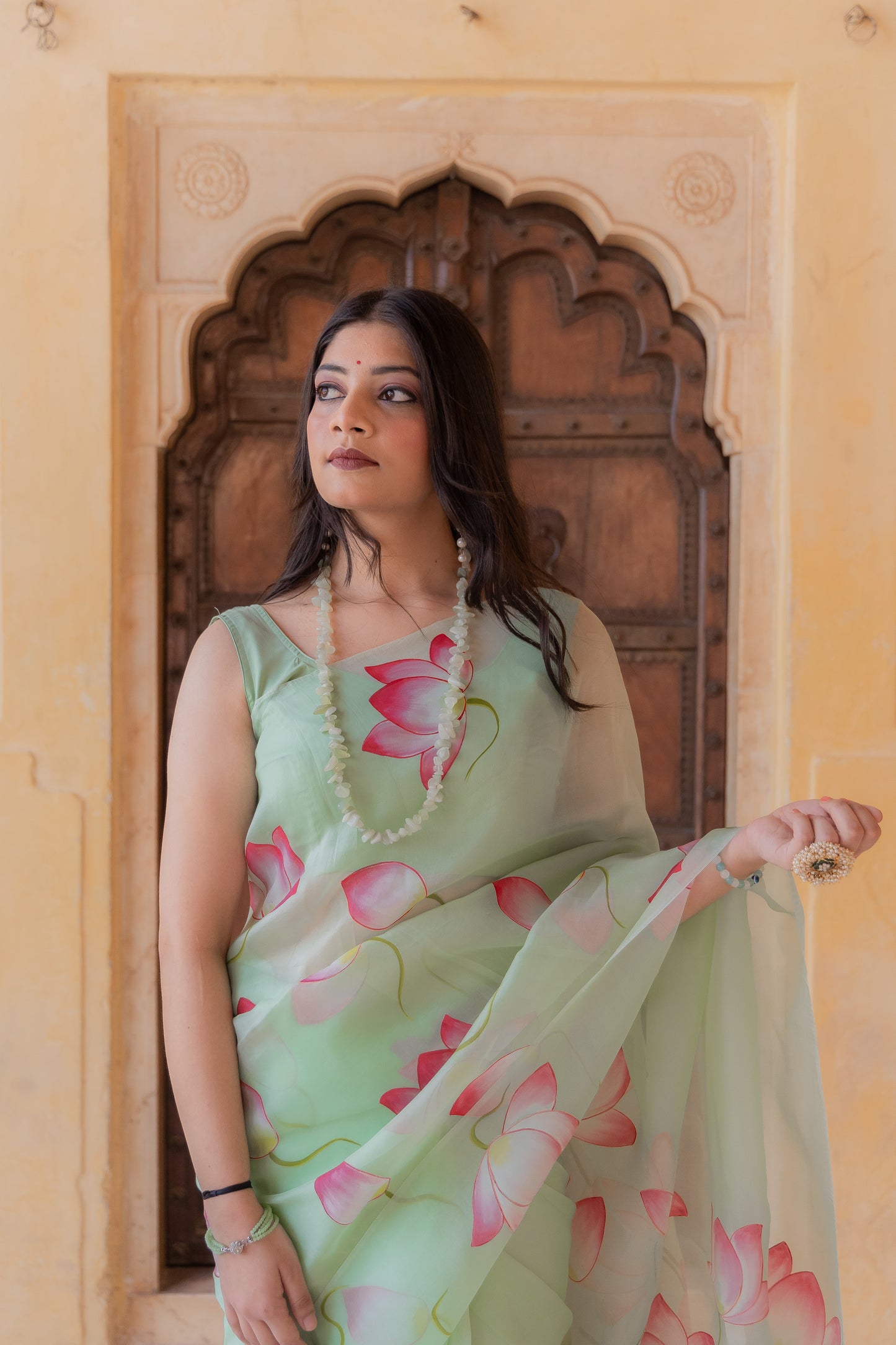 Draped in serenity, adorned with lotus beauty 🌸✨