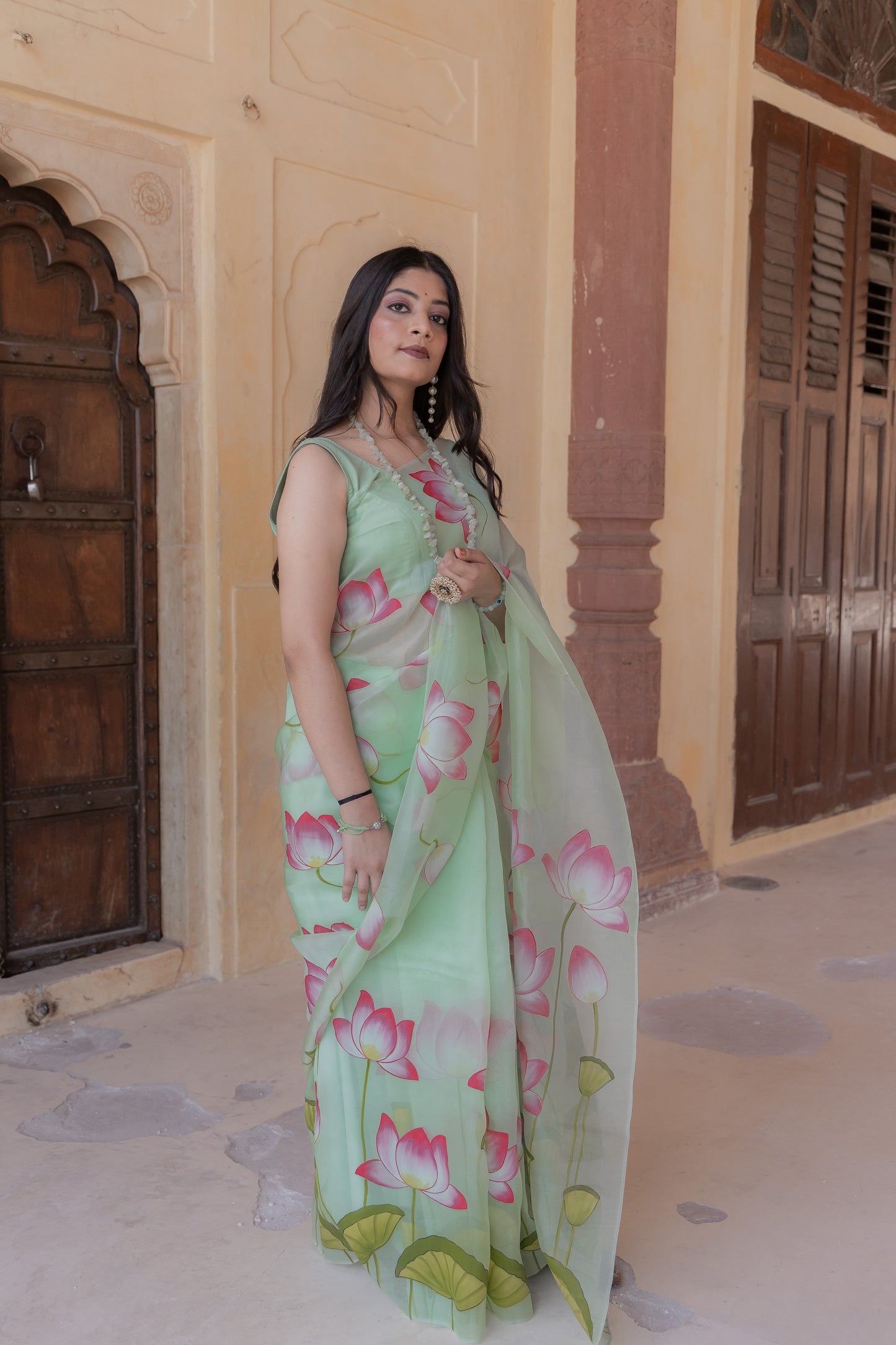 Draped in serenity, adorned with lotus beauty 🌸✨