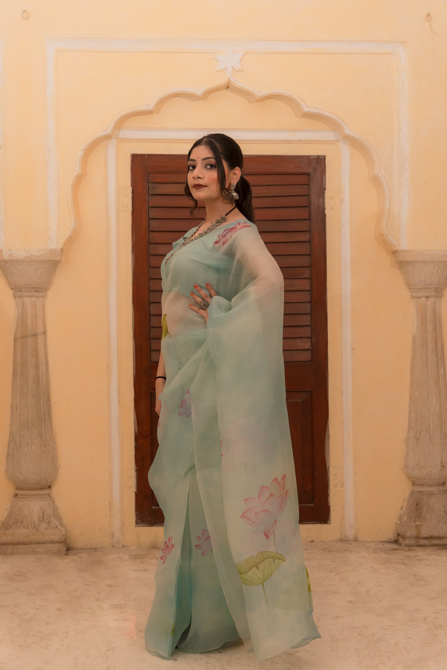 Sea blue dreams adorned with Pichwai magic. 🌊💫