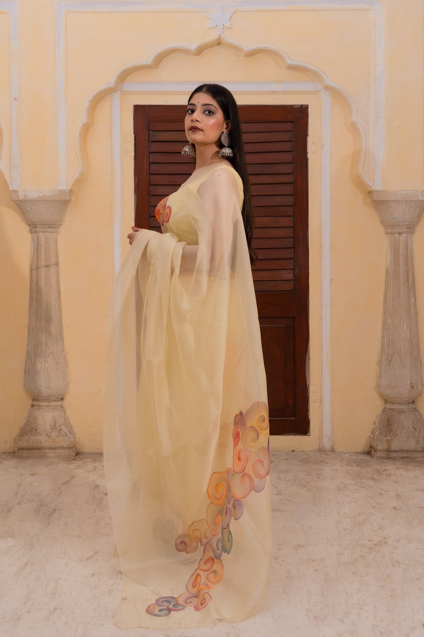 Float through the day in this cheerful yellow saree adorned with vibrant clouds ☁️💛