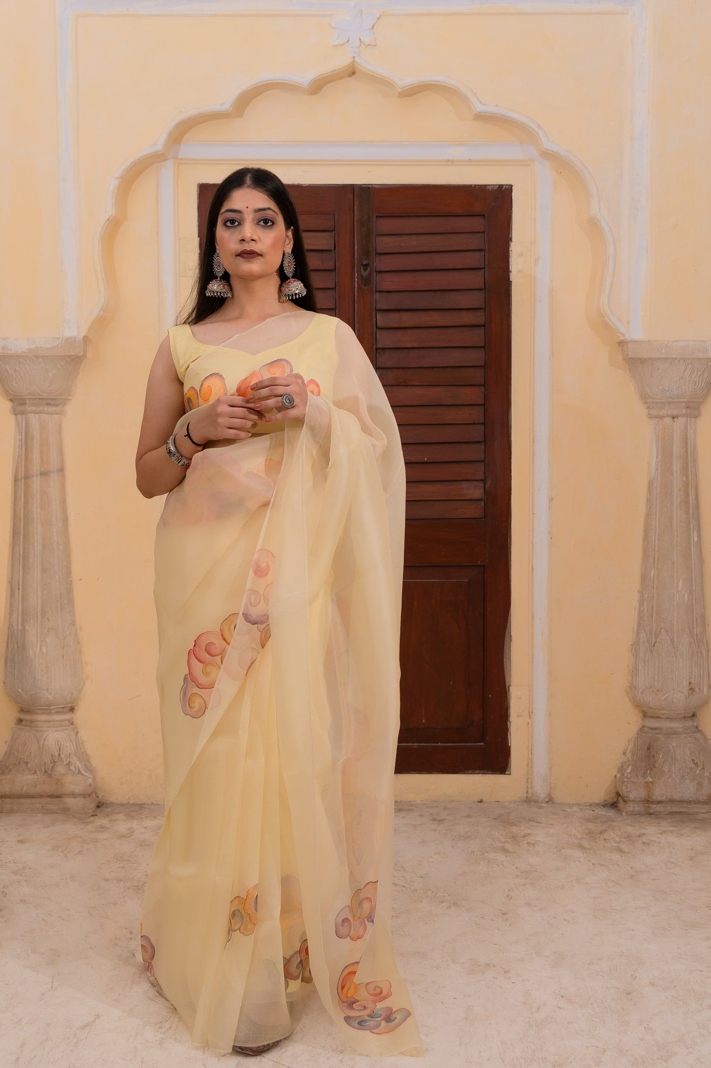 Float through the day in this cheerful yellow saree adorned with vibrant clouds ☁️💛
