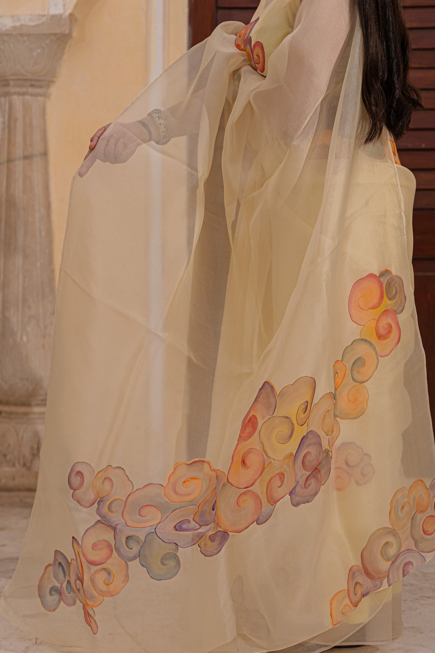 Float through the day in this cheerful yellow saree adorned with vibrant clouds ☁️💛