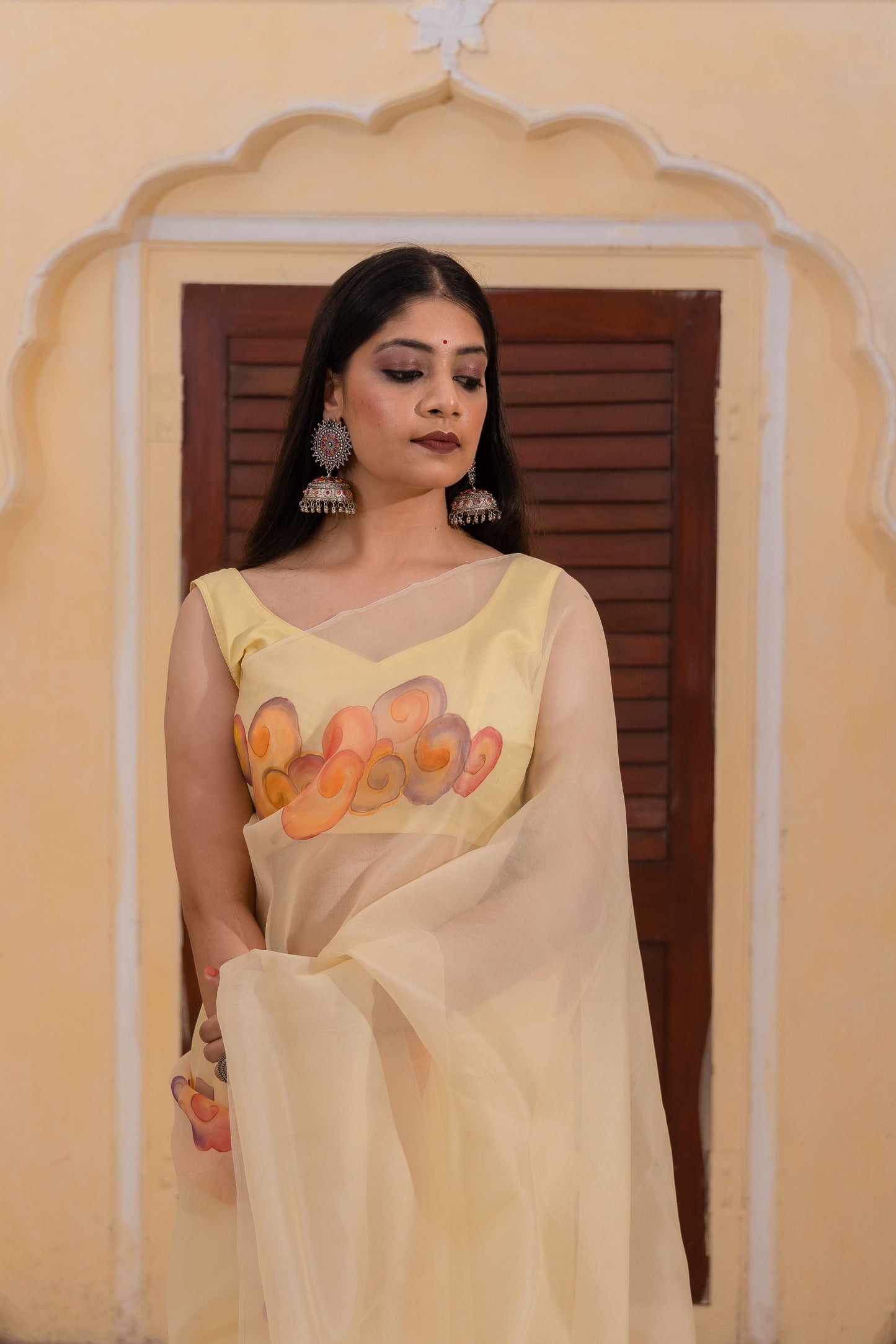 Float through the day in this cheerful yellow saree adorned with vibrant clouds ☁️💛