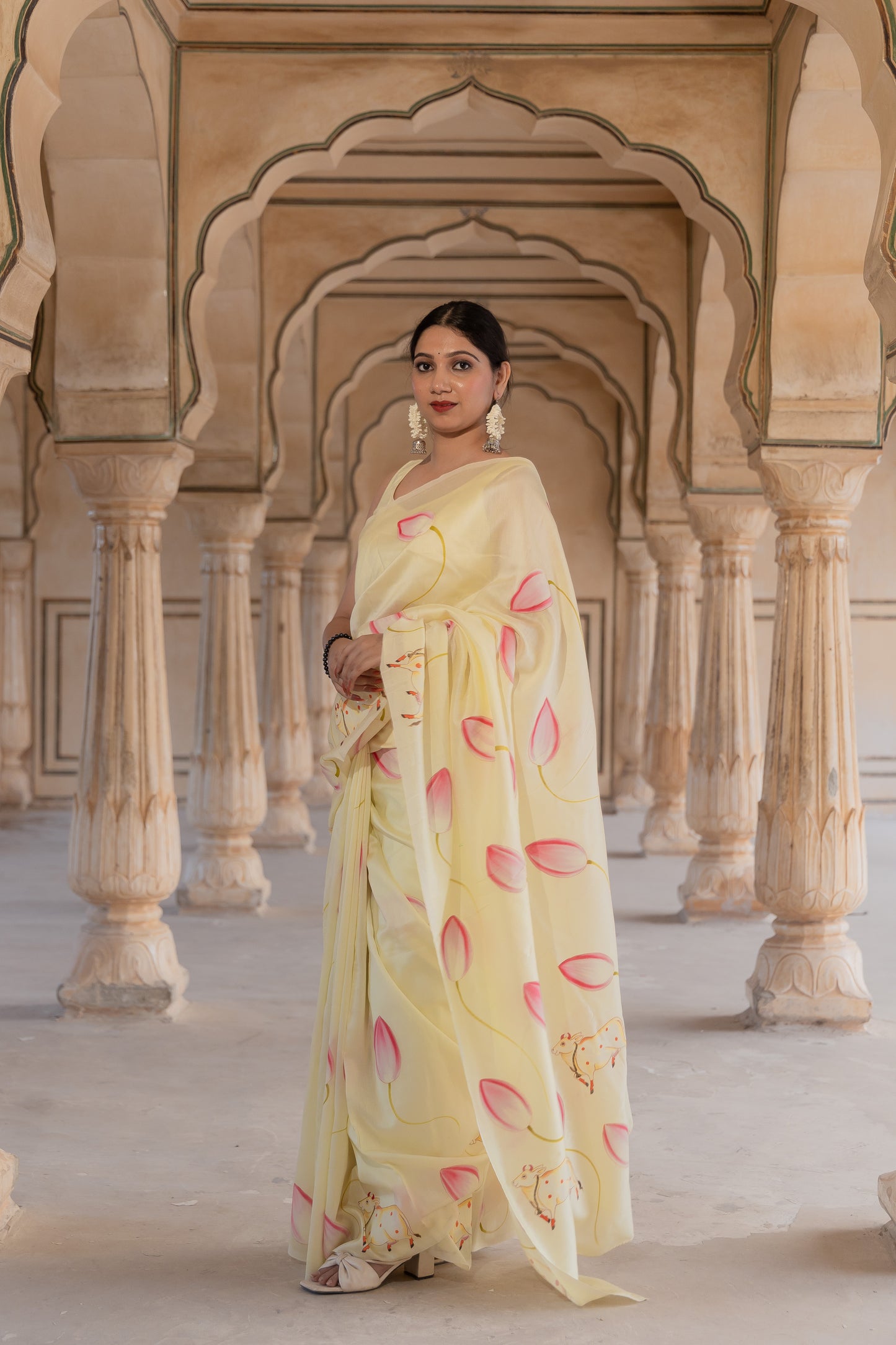 Where lotus blooms and cows roam, elegance finds its home.