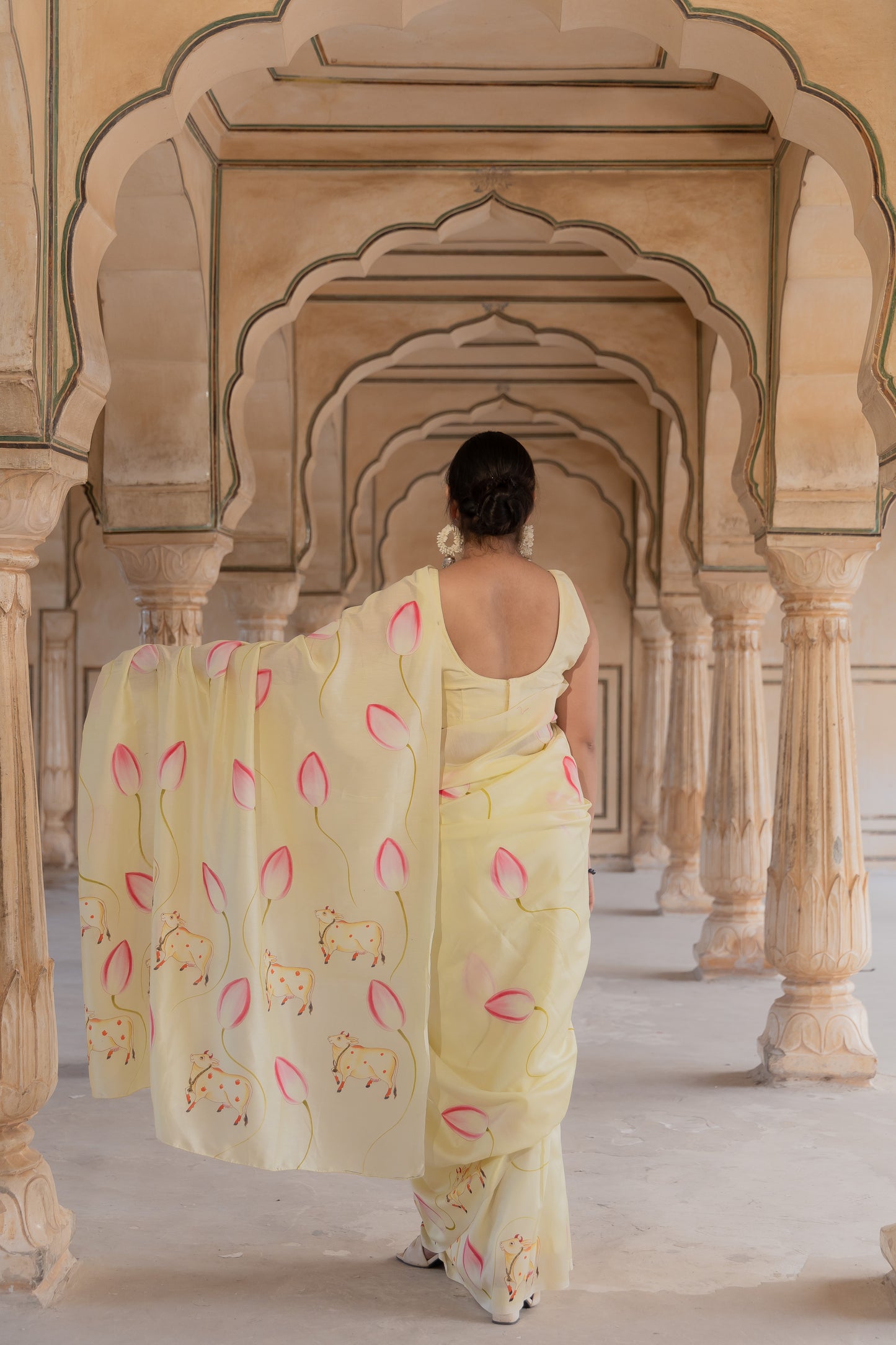 Where lotus blooms and cows roam, elegance finds its home.